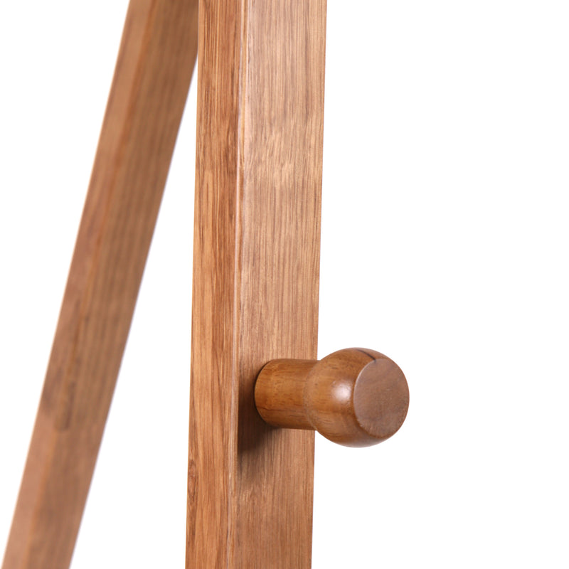 Close up of wooden pegs that hold up the chalkboard on the brown easel EASEL-W-LB