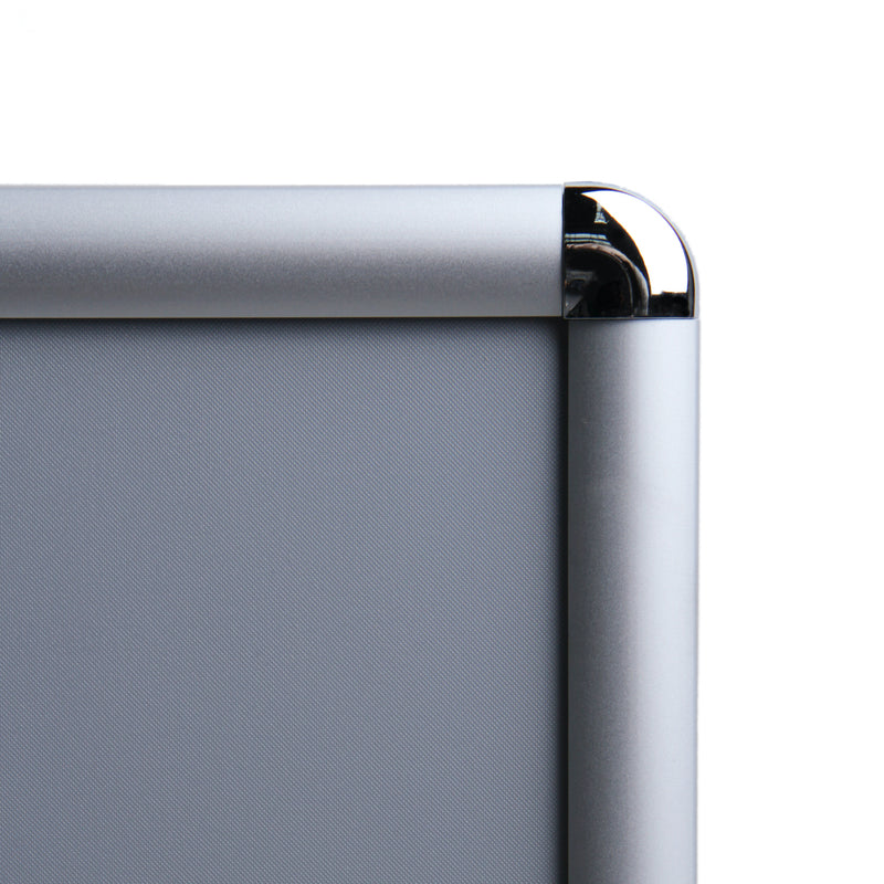 Corner of closed poster frame with rounded corners.