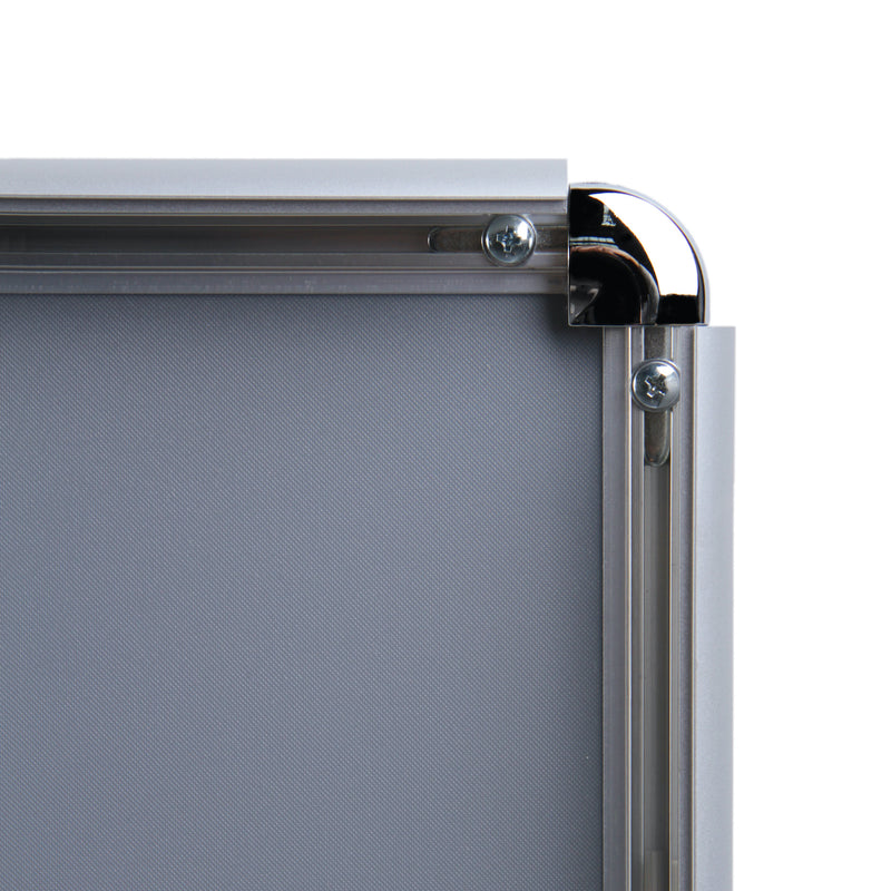 Corner of open poster frame with rounded corner.