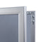 Open door of lockable poster frame